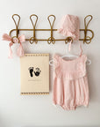 hanging banner in cotton with footprint and handprint printed in black
