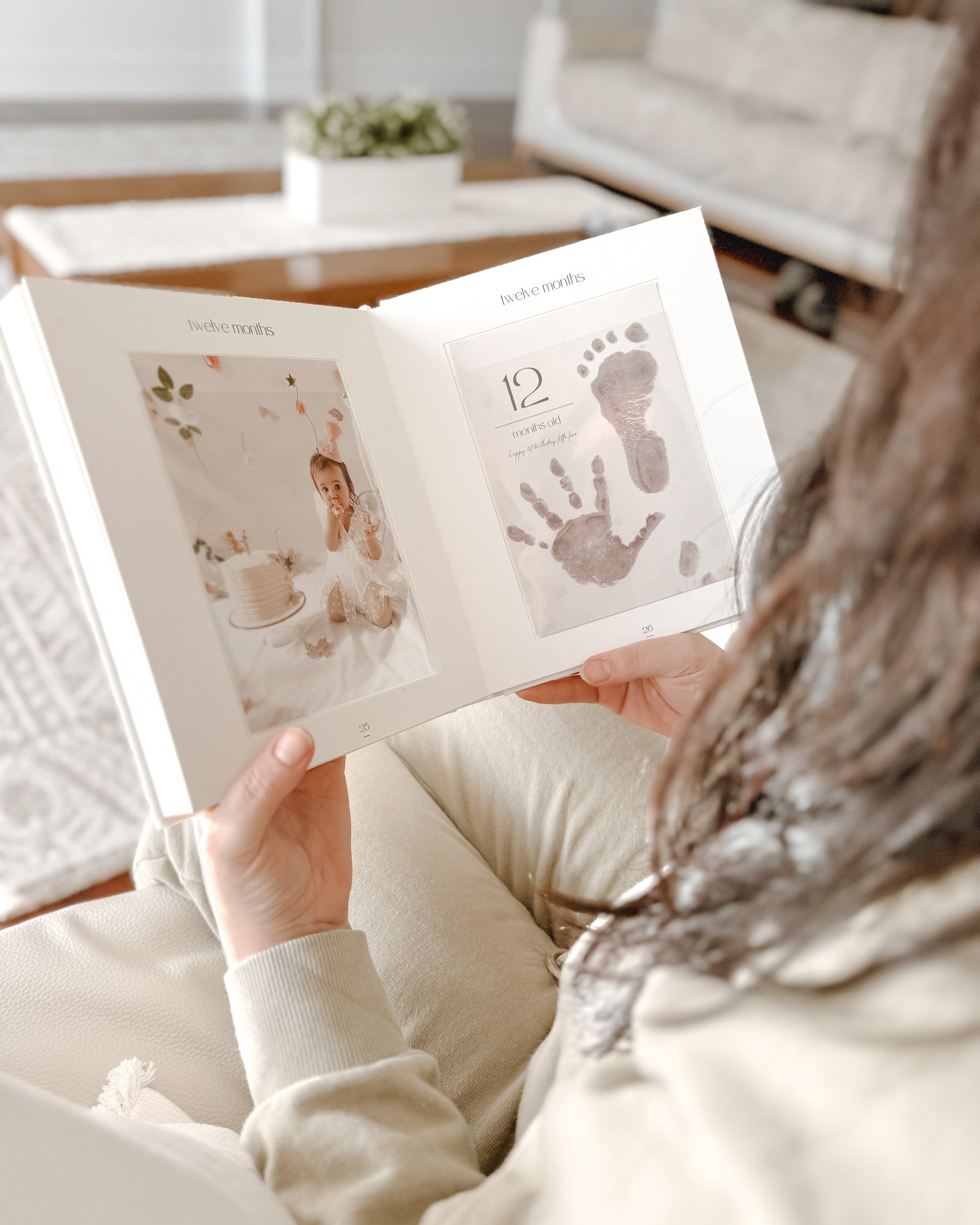 baby monthly keepsake photo album with linen cover in neutral colour and gold foil for safekeeping of inkless milestone cards