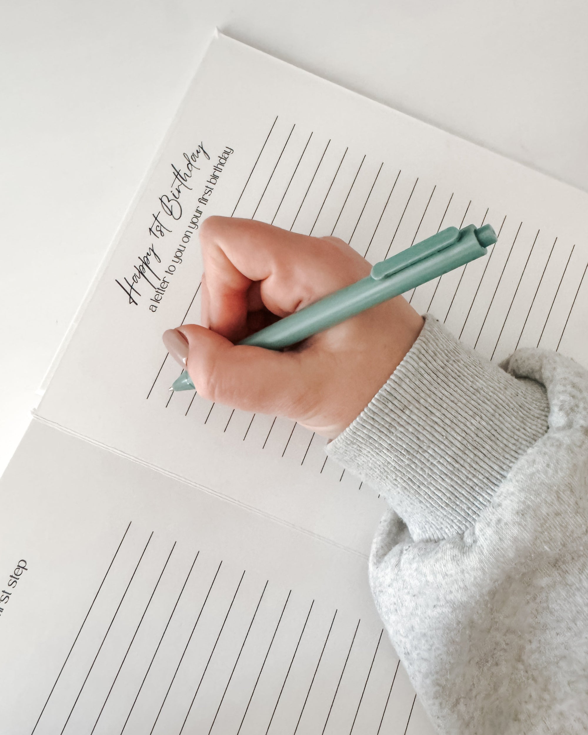 keepsake album with baby first birthday letter - gold foil beige linen cover