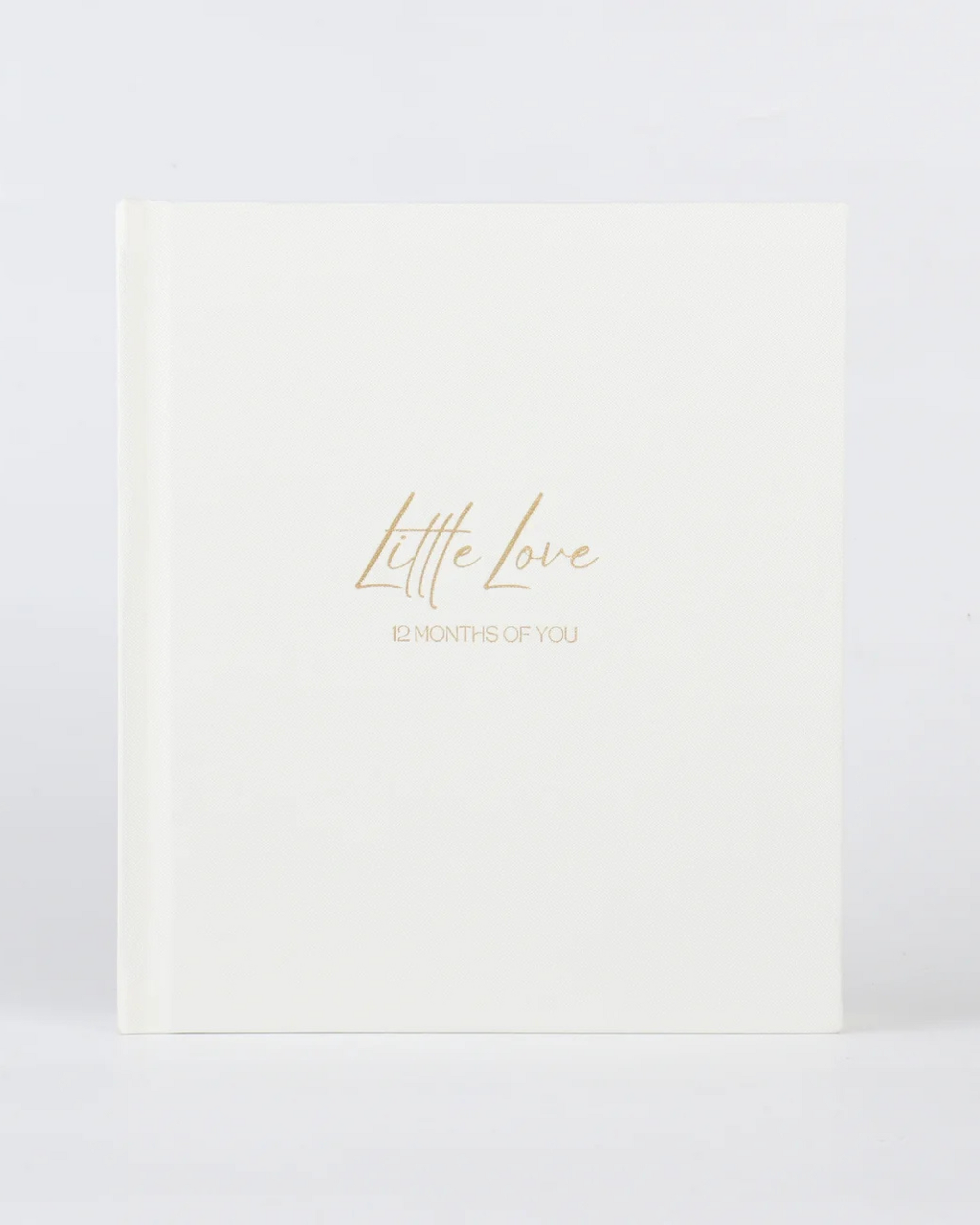 12-month baby photo album with space for hand and footprints, photos, and milestone cards – gold foil linen cover