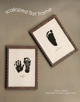 Two framed prints of hand and footprints with scalloped flat frames on a beige background.