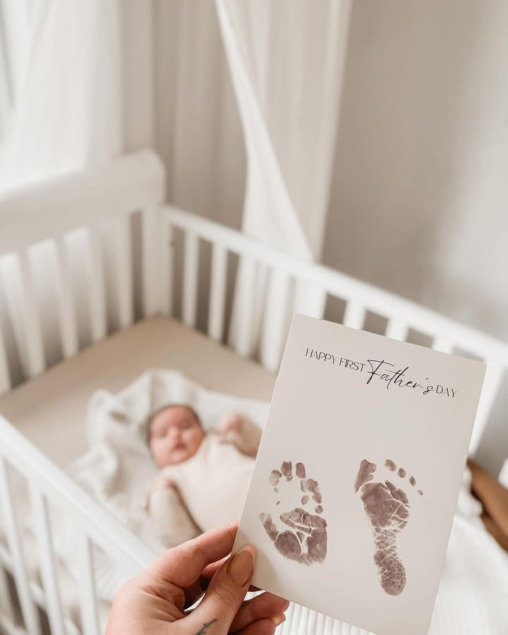 baby footprint and handprint card for first fathers day and mother day 