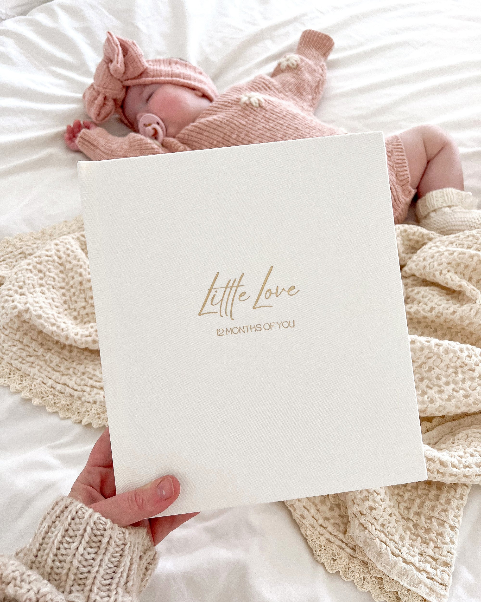12-month baby photo album with space for hand and footprints, photos, and milestone cards – gold foil linen cover